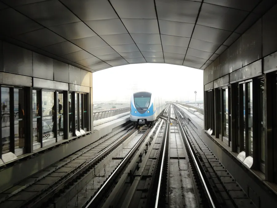 A Dubai Metro train at a station on the Red Line