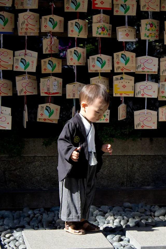 A boy in traditional dress at a shrine for Shichi-Go-San.