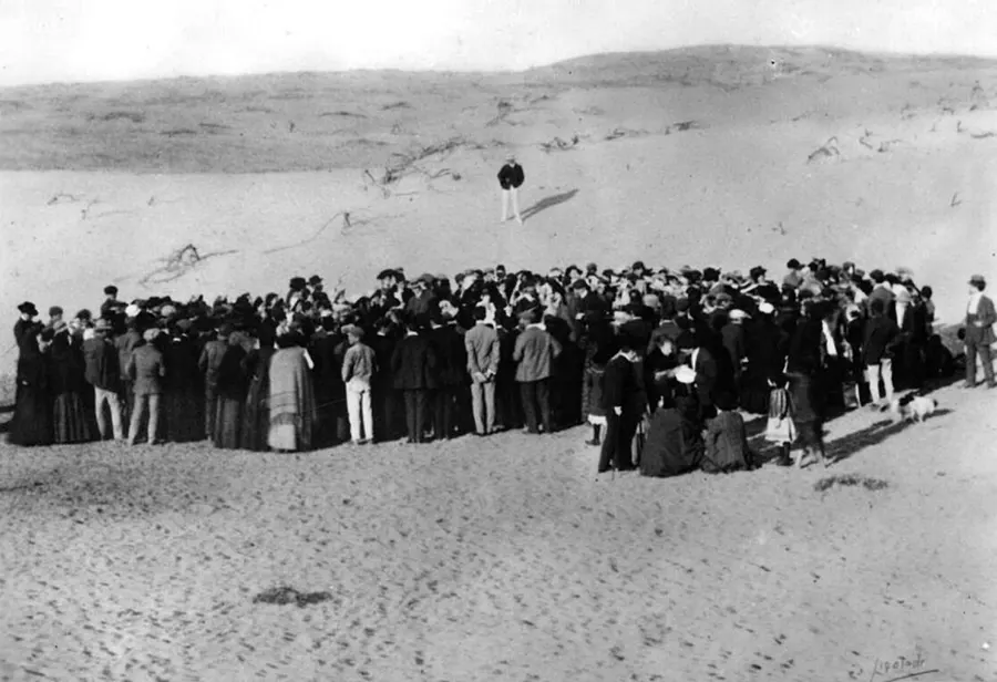 Families gather on the dunes north of Jaffa to share out the first plots of Tel Aviv, 1909, photographed by Avraham Soskin.