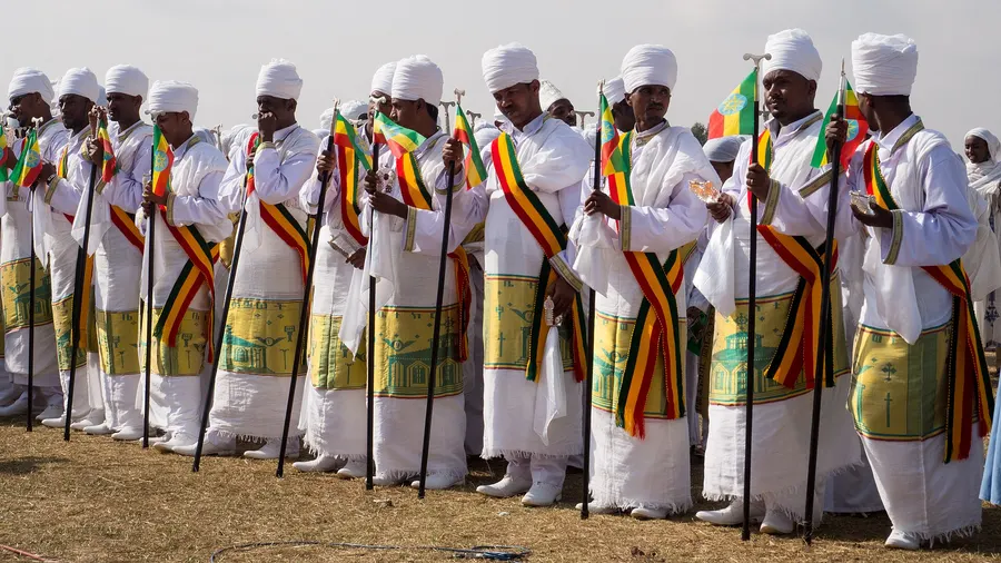Ethiopian Orthodox priests in white robes before the Timkat ceremony at Jan Meda, Addis Ababa, 19 January 2015.