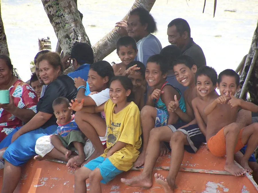 Islanders on Niutao, one of Tuvalu's nine islands, wait for the inter-island ferry, 2006.