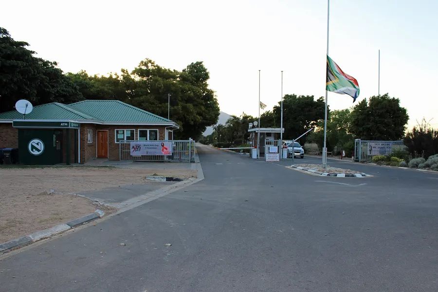 The entrance to Drakenstein Correctional Centre near Paarl, formerly Victor Verster Prison, with the South African flag at half-mast after Mandela's death in December 2013.