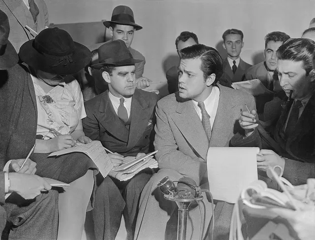 Orson Welles meets reporters after the broadcast, 31 October 1938.