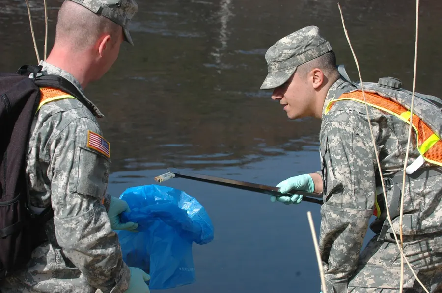 Soldiers clearing litter from a river in South Korea for World Water Day, 2009.